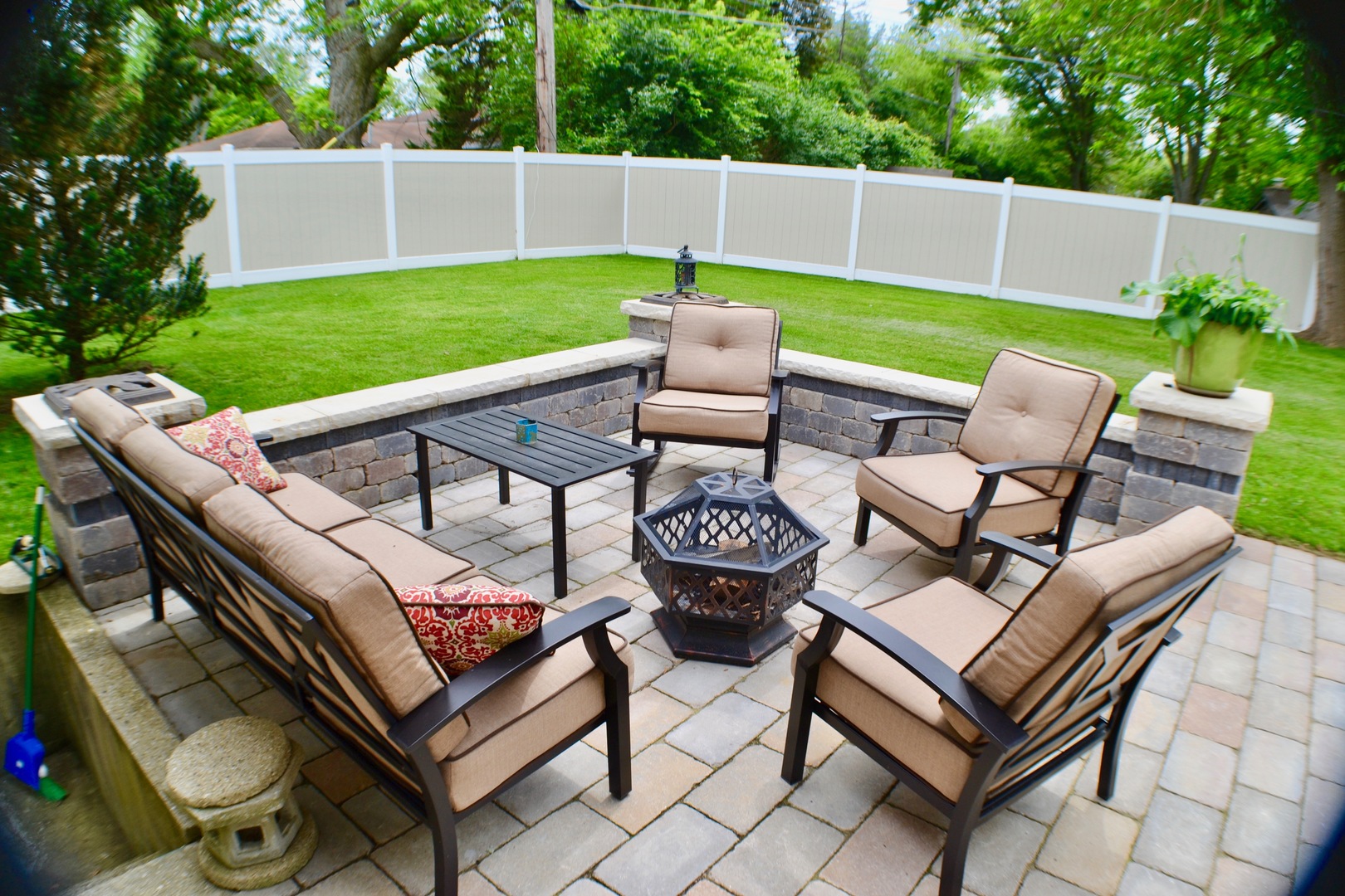 2014 Driving Park Road Wheaton, IL 60187 - Photo 26 of 32 a view of a patio with couches chairs and a fire pit