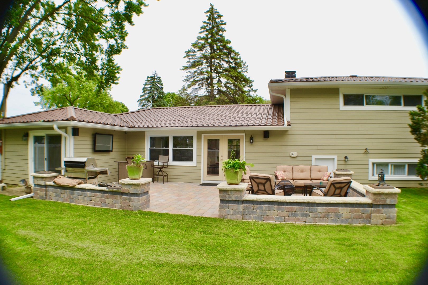 2014 Driving Park Road Wheaton, IL 60187 - Photo 30 of 32 a view of a house with a patio