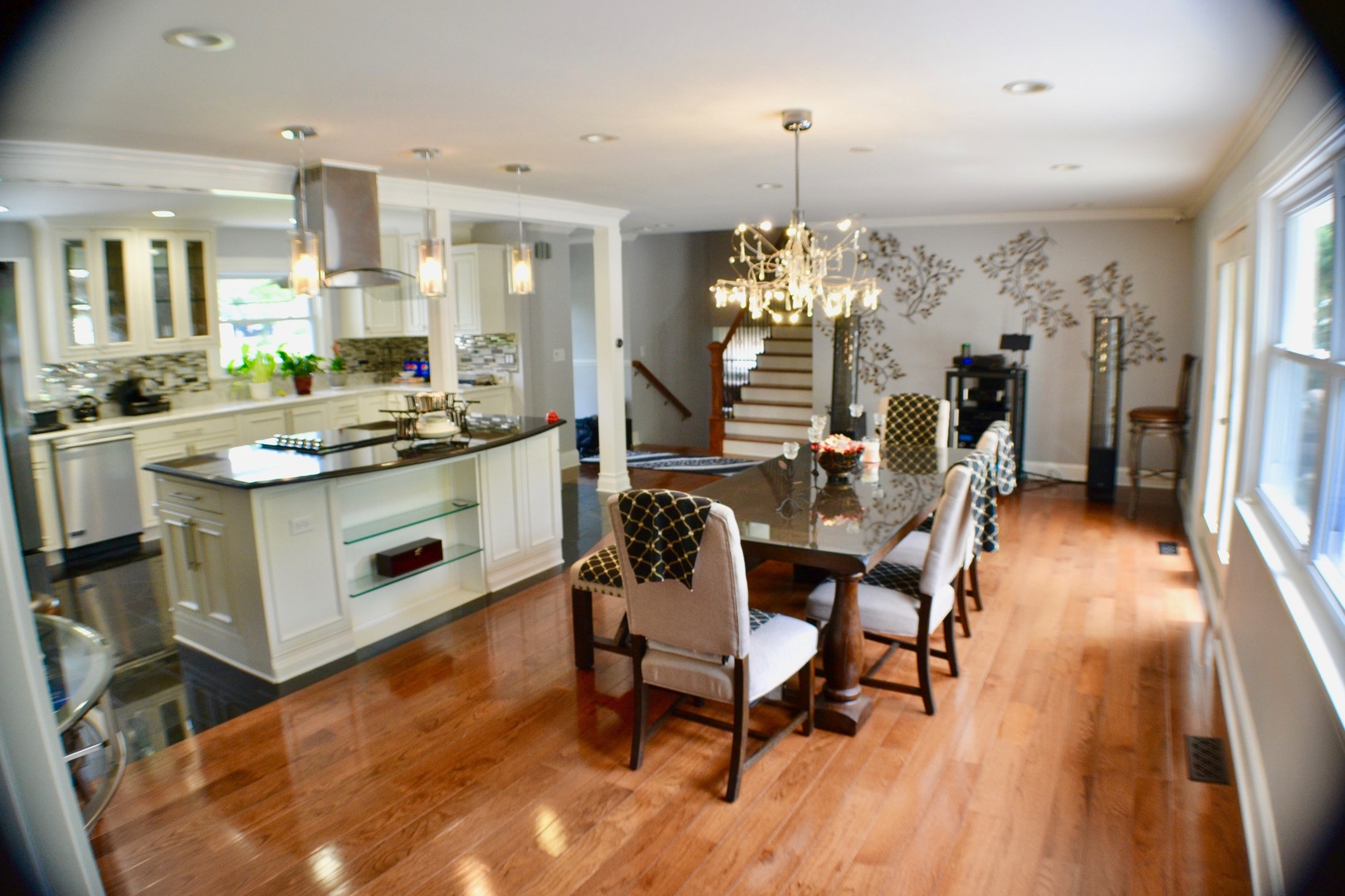 2014 Driving Park Road Wheaton, IL 60187 - Photo 6 of 32 a kitchen with stainless steel appliances a dining table chairs stove refrigerator and cabinets