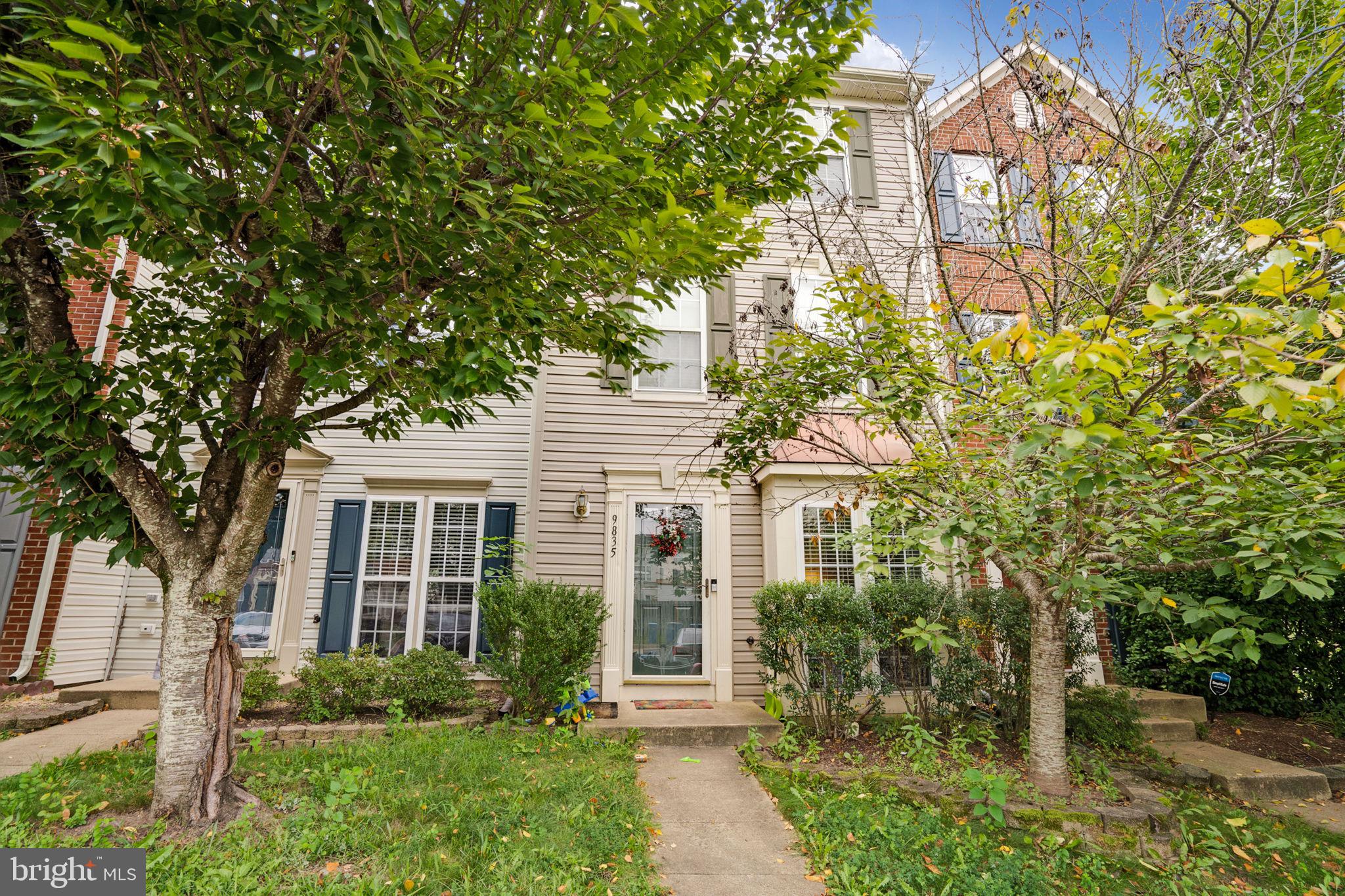 9835 Maitland Loop Bristow, VA 20136 - Photo 1 of 41 front view of a house with a yard