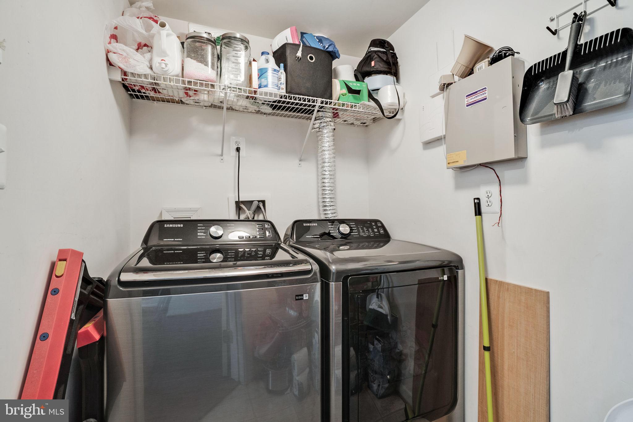 9835 Maitland Loop Bristow, VA 20136 - Photo 15 of 41 a view of storage and utility room with racks on the wall