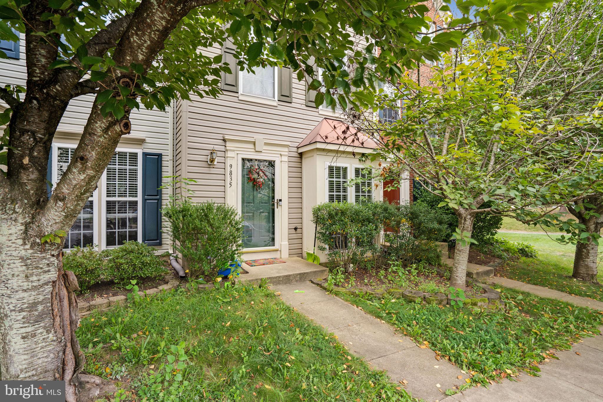 9835 Maitland Loop Bristow, VA 20136 - Photo 2 of 41 a view of house with a yard and potted plants