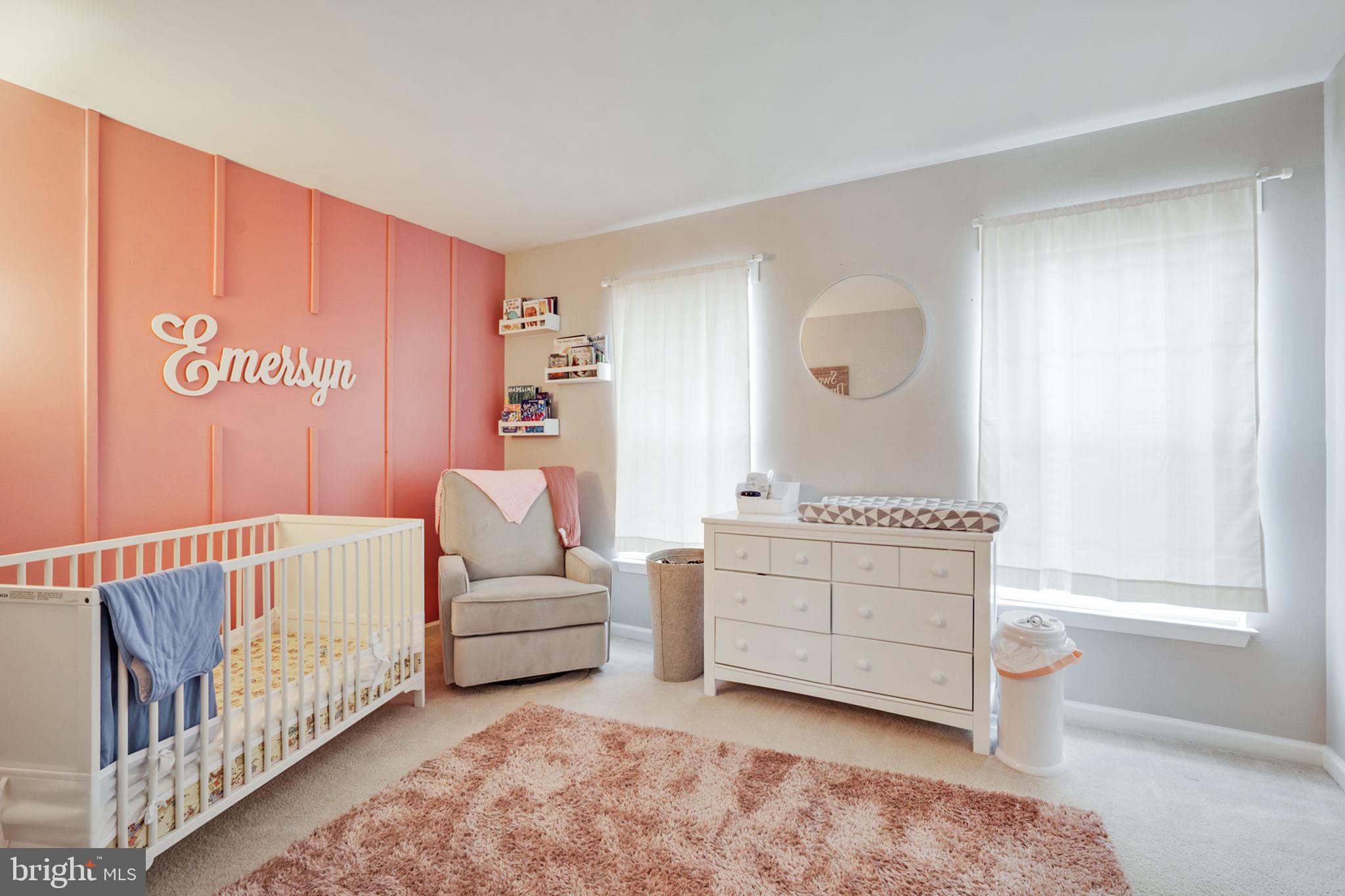 9835 Maitland Loop Bristow, VA 20136 - Photo 25 of 41 a bed room with furniture and a window