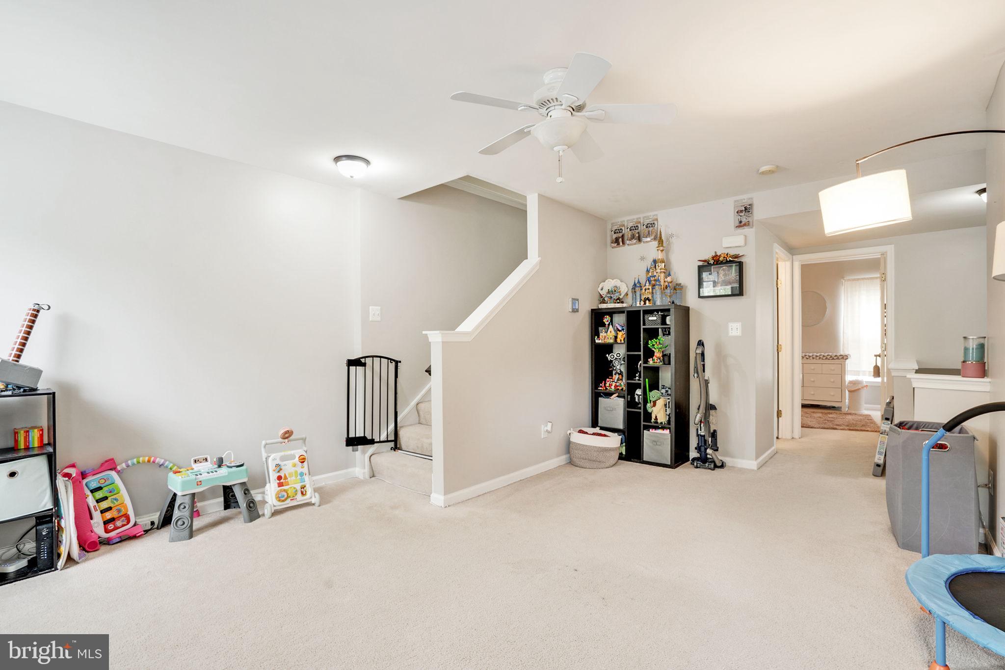 9835 Maitland Loop Bristow, VA 20136 - Photo 30 of 41 a view of game room with window and refrigerator
