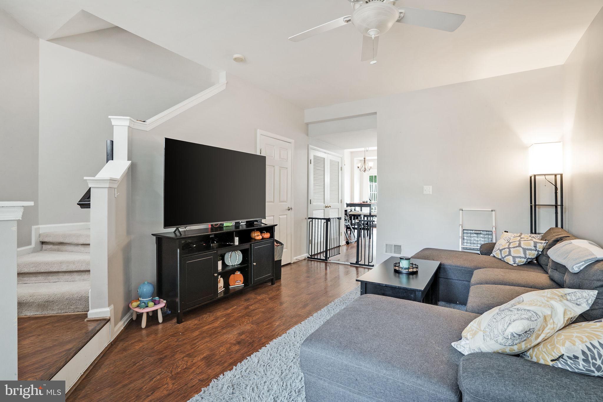 9835 Maitland Loop Bristow, VA 20136 - Photo 3 of 41 a living room with furniture and a flat screen tv
