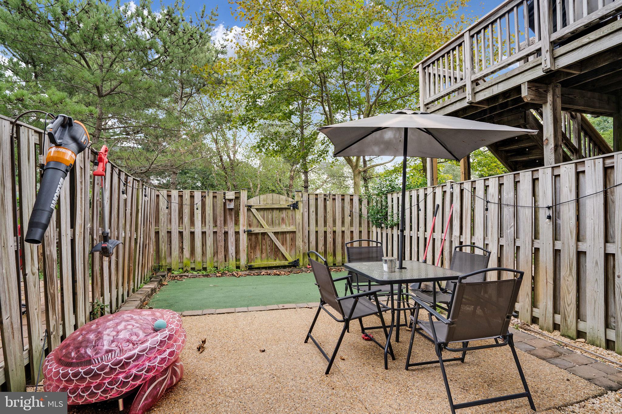 9835 Maitland Loop Bristow, VA 20136 - Photo 34 of 41 a view of a chairs and table in the patio