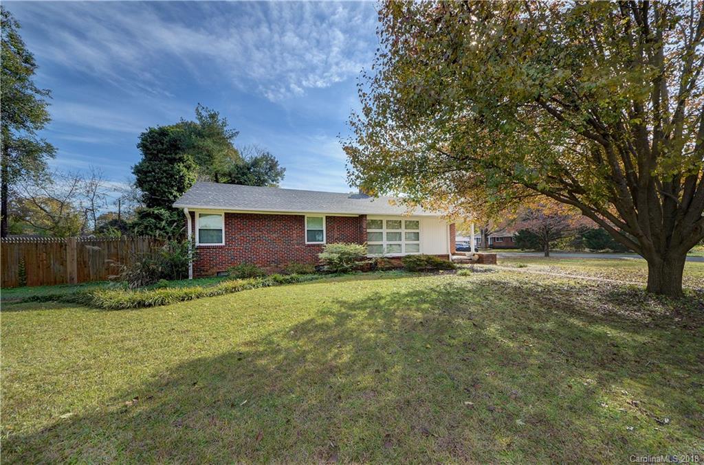 4301 Applegate Road Charlotte, NC 28209 - Photo 2 of 30 a view of a yard with a house and a large tree