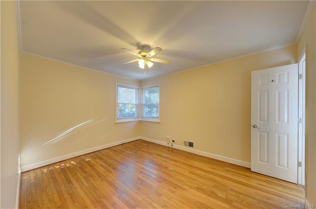 4301 Applegate Road Charlotte, NC 28209 - Photo 16 of 30 wooden floor in an empty room with a window