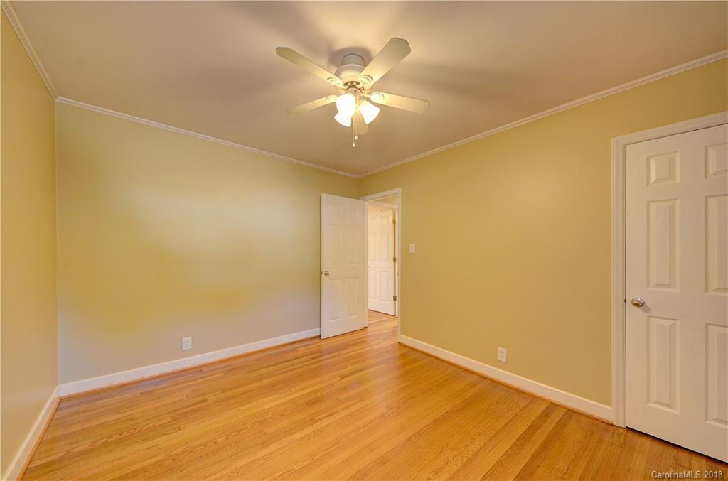 4301 Applegate Road Charlotte, NC 28209 - Photo 23 of 30 a view of an empty room with wooden floor