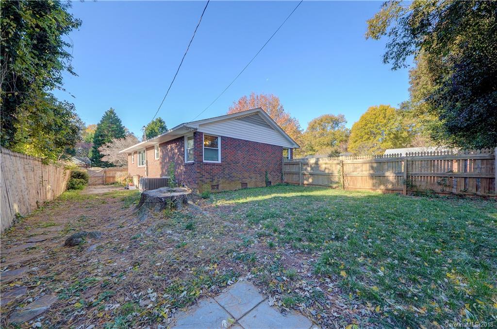 4301 Applegate Road Charlotte, NC 28209 - Photo 28 of 30 a view of a house with backyard and trees