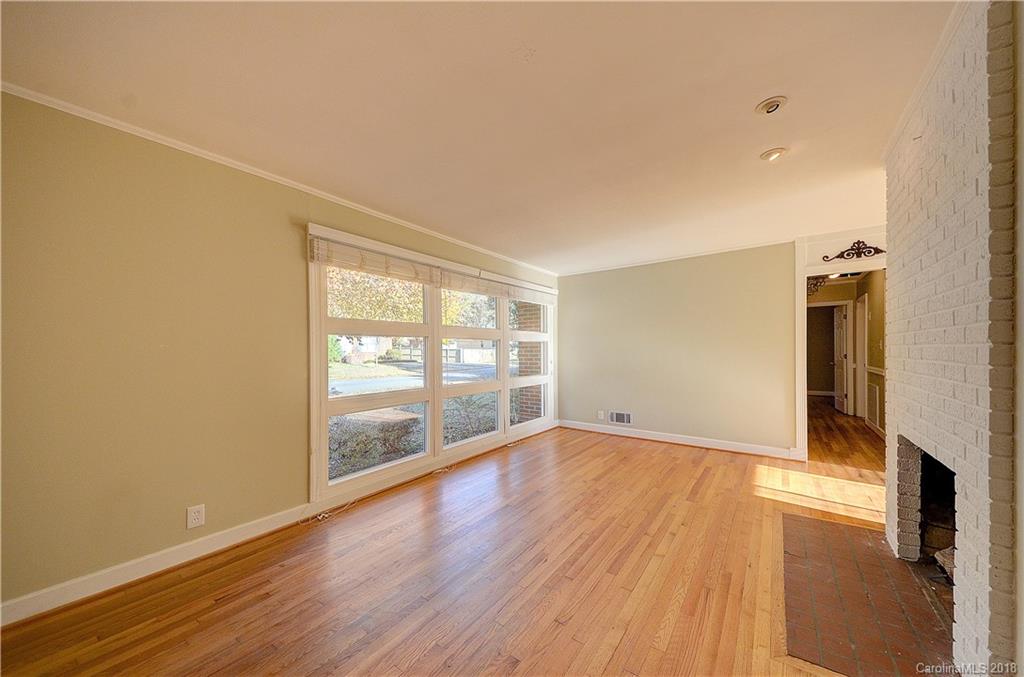4301 Applegate Road Charlotte, NC 28209 - Photo 5 of 30 wooden floor in an empty room with a window