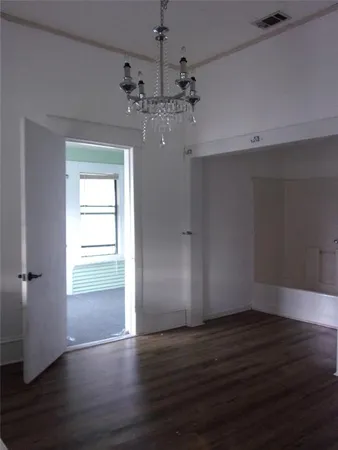 a bathroom with a sink window and a mirror