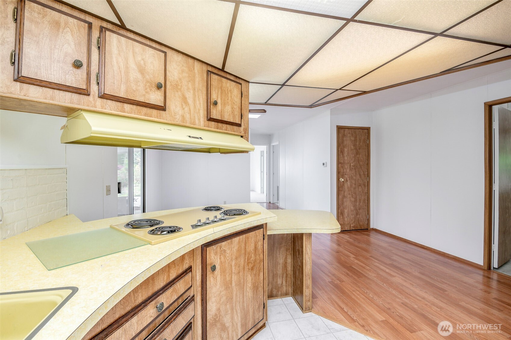 201 Union Avenue Southeast, Unit 147 Renton, WA 98059 - Photo 10 of 20 a utility room with a wooden floor