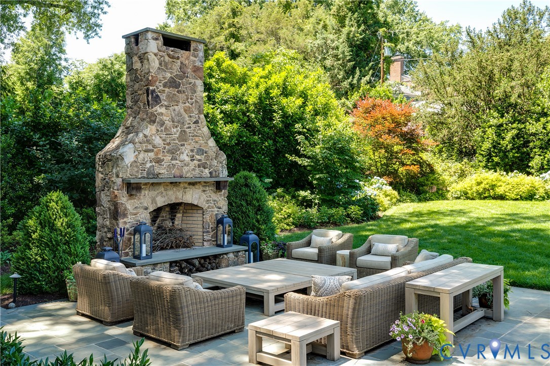 6 Berkshire Road Richmond, VA 23221 - Photo 63 of 66 a backyard of a house with outdoor seating