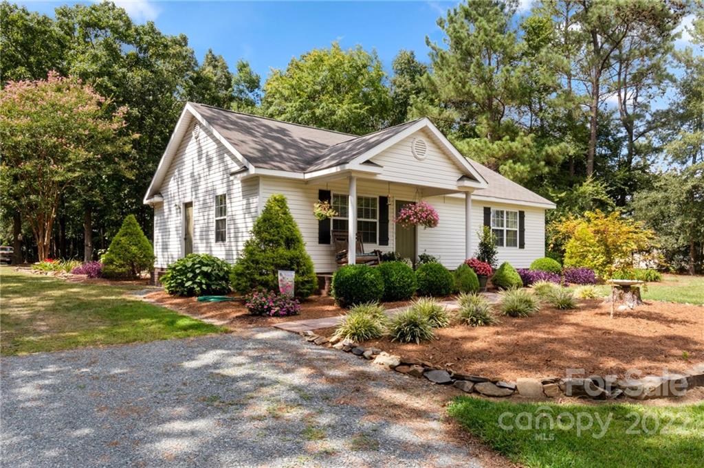 1801 Mullis Road Monroe, NC 28112 - Photo 1 of 27 a front view of a house with a yard