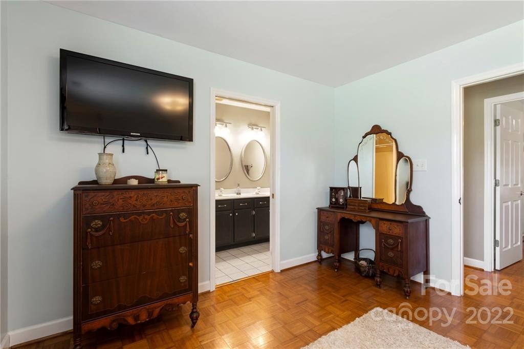 1801 Mullis Road Monroe, NC 28112 - Photo 14 of 27 a living room with furniture and a flat screen tv