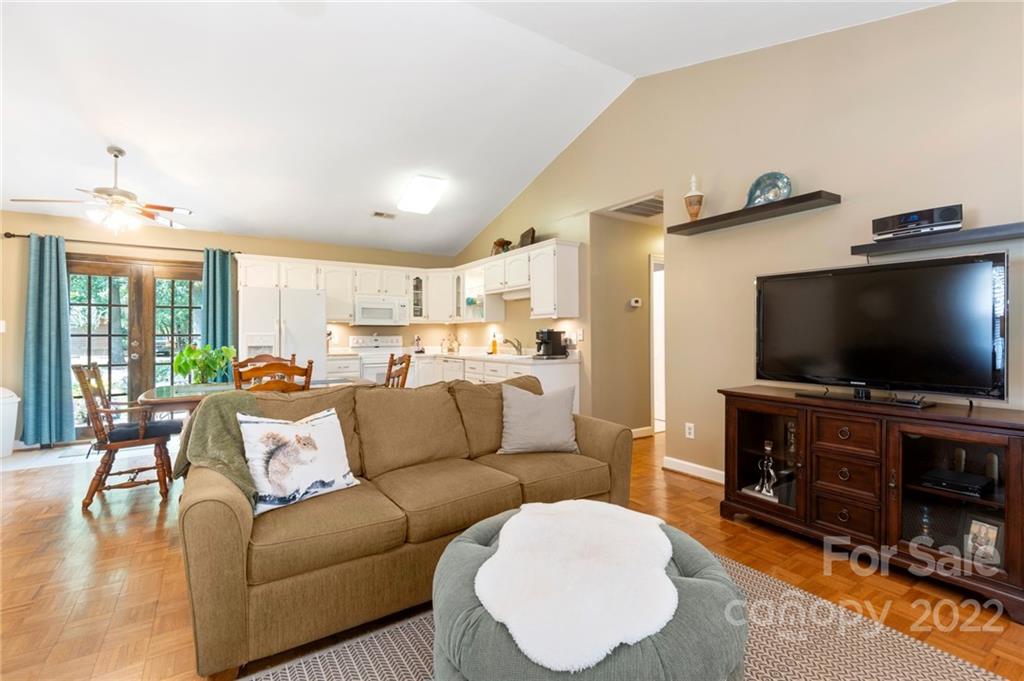1801 Mullis Road Monroe, NC 28112 - Photo 9 of 27 a living room with furniture and a flat screen tv