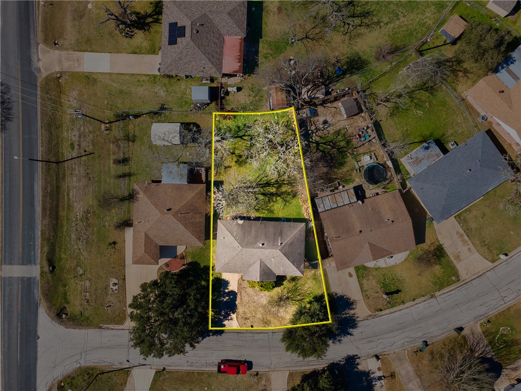 3003 Kim Street Bryan, TX 77803 - Photo 17 of 21 an aerial view of residential houses with outdoor space