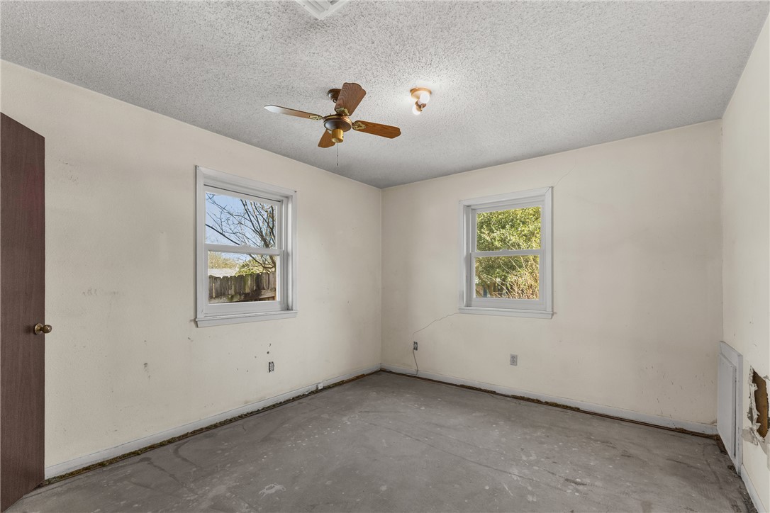3003 Kim Street Bryan, TX 77803 - Photo 10 of 21 an empty room with windows