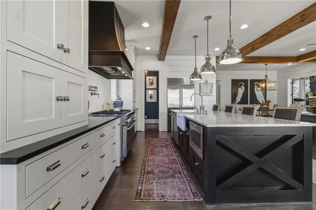 a view of a livingroom with furniture and fireplace