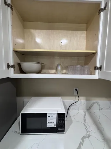 a view of storage and utility room