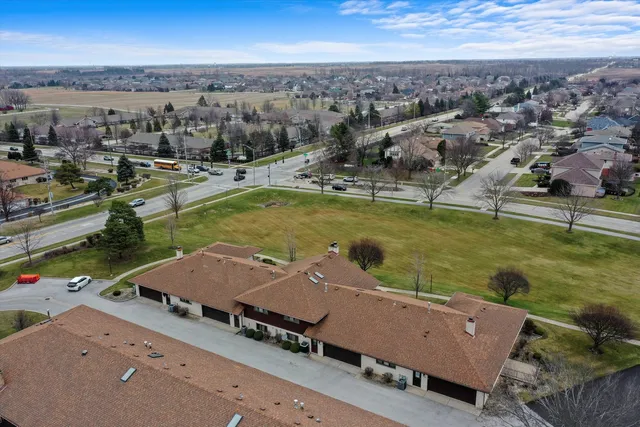 a view of a garden with houses