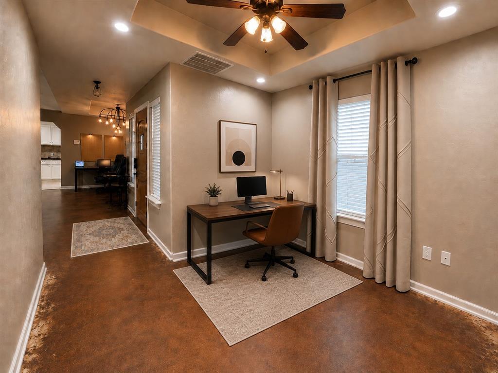 420 Sessums Road Springtown, TX 76082 - Photo 16 of 40 Office space featuring a tray ceiling with recessed lighting and a ceiling fan, a window with blinds and drapes, and wood-finish flooring-Virtually staged