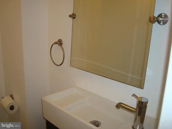 a room with window and a couch