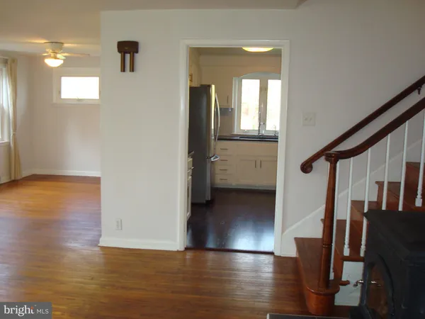 a view of a house with a yard and plants