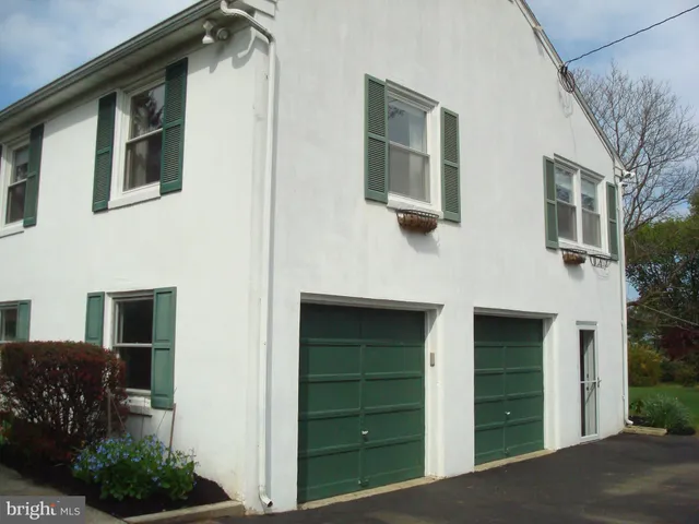 a view of a house with a big yard