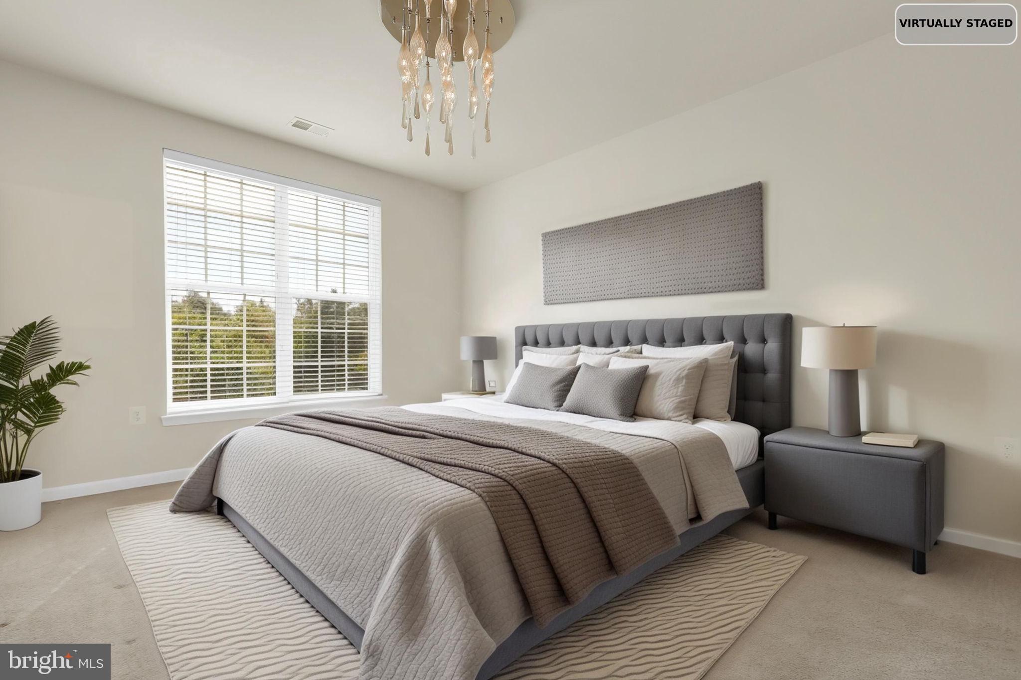 3750 Clara Downey Avenue, Unit 34 Silver Spring, MD 20906 - Photo 15 of 25 a bedroom with bed and a window