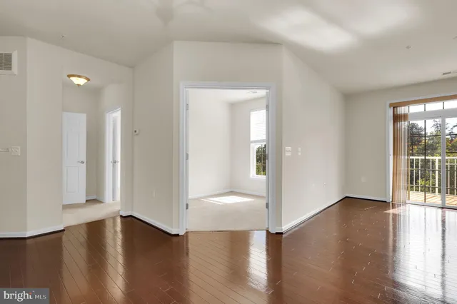 a view of entryway with wooden floor
