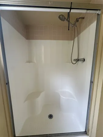 a bathroom with a bath tub