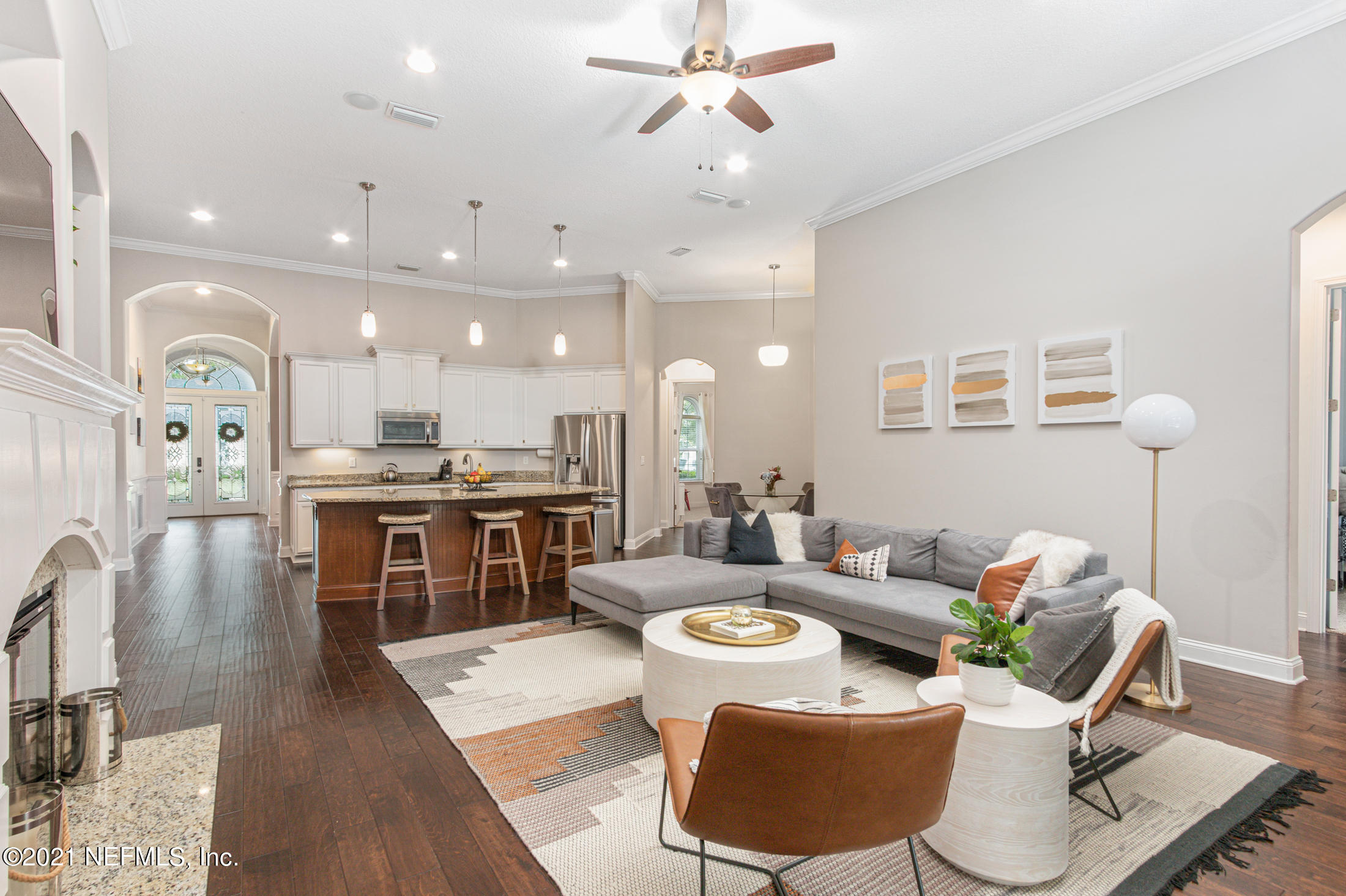 198 Glen Laurel Drive St. Johns, FL 32259 - Photo 51 of 51 a living room with kitchen island furniture and a kitchen view