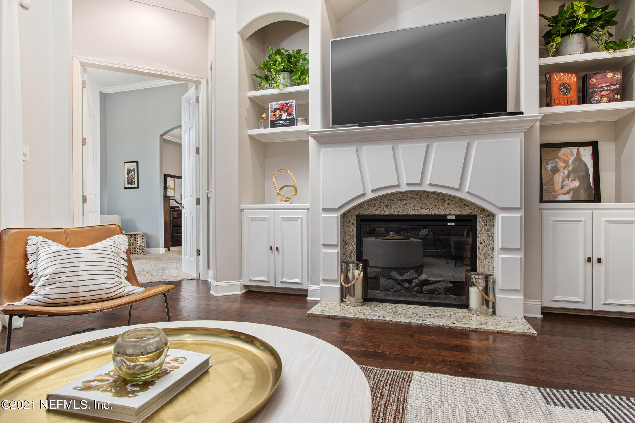 198 Glen Laurel Drive St. Johns, FL 32259 - Photo 20 of 51 a living room with furniture and a fireplace