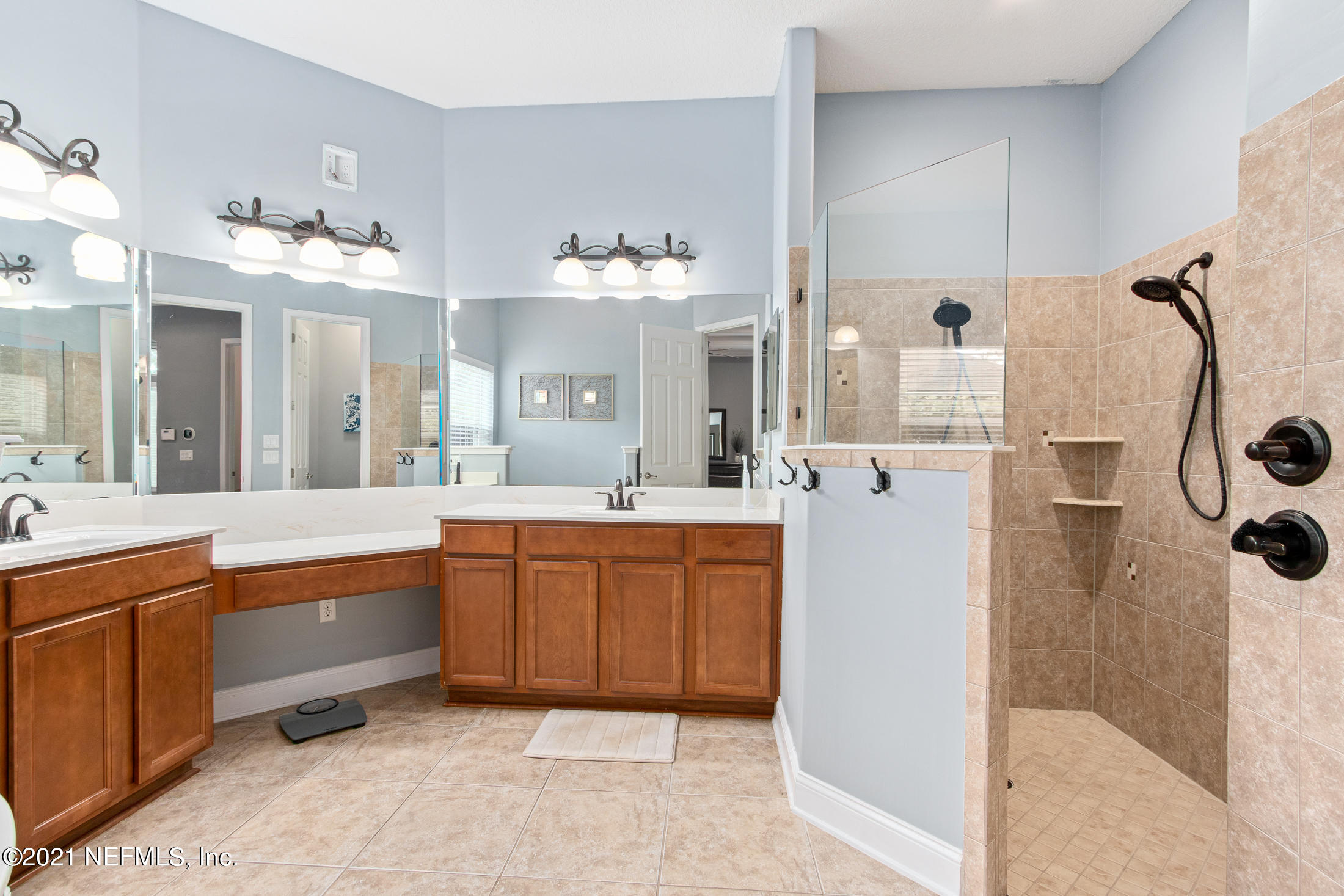 198 Glen Laurel Drive St. Johns, FL 32259 - Photo 26 of 51 a large bathroom with a double vanity sink mirror and shower