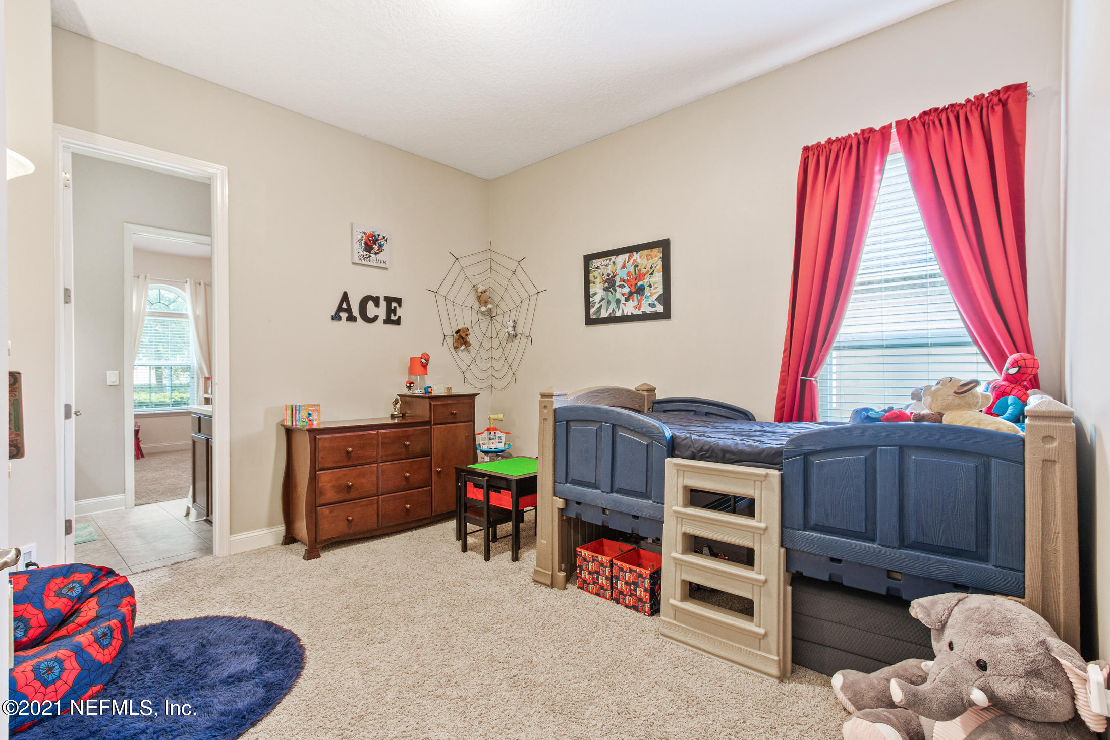 198 Glen Laurel Drive St. Johns, FL 32259 - Photo 32 of 51 a bedroom with furniture and a window