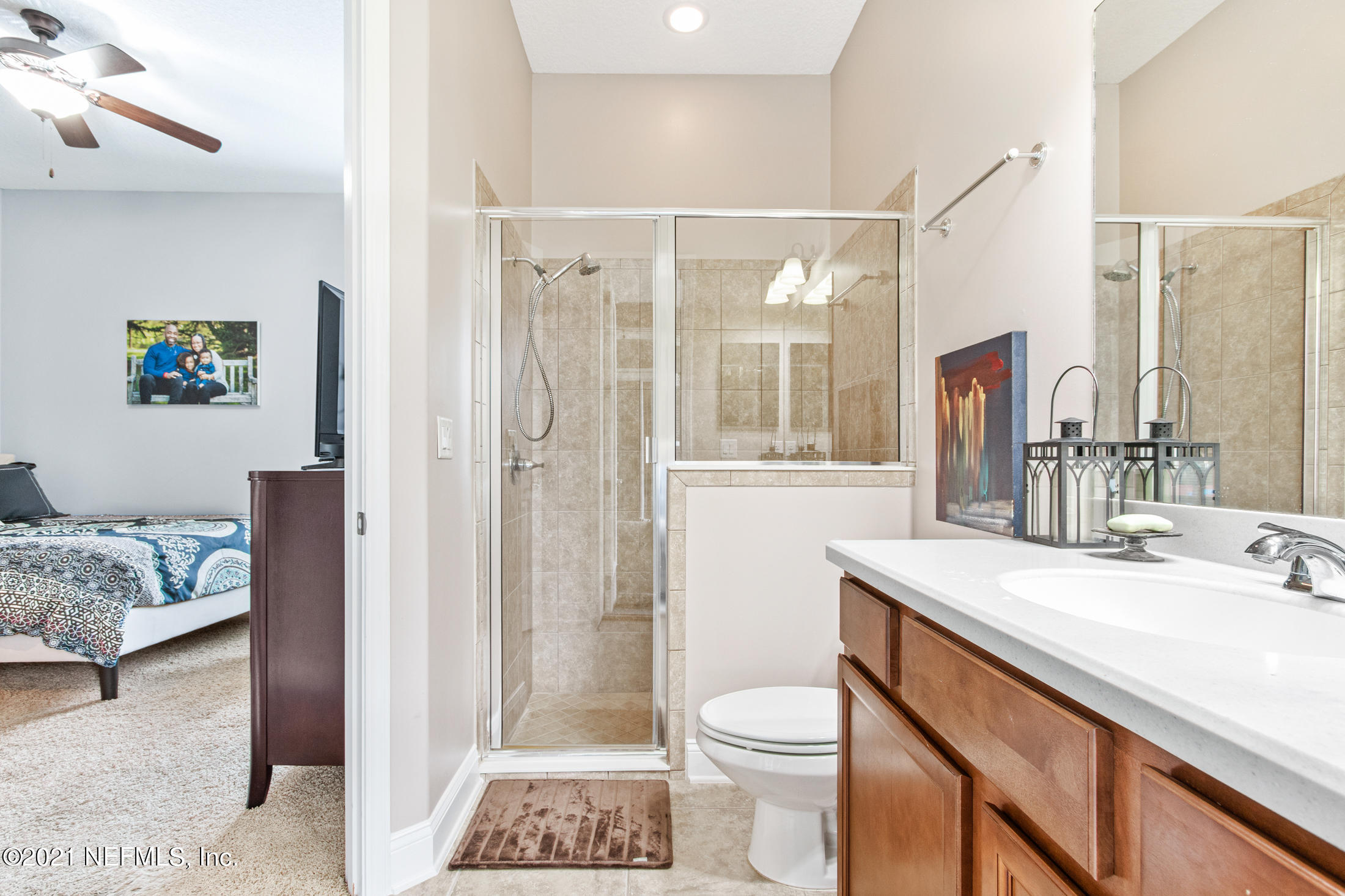 198 Glen Laurel Drive St. Johns, FL 32259 - Photo 35 of 51 a bathroom with a sink a toilet and shower