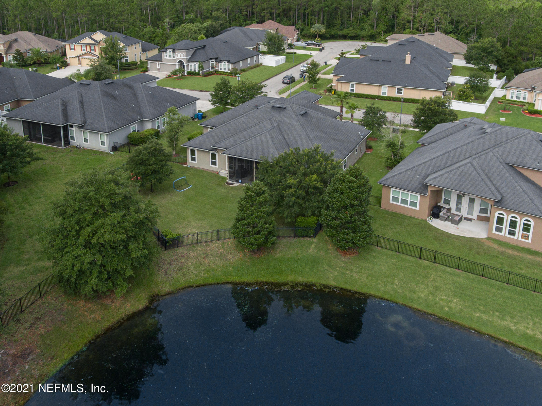 198 Glen Laurel Drive St. Johns, FL 32259 - Photo 47 of 51 an aerial view of a house with garden space and a lake view