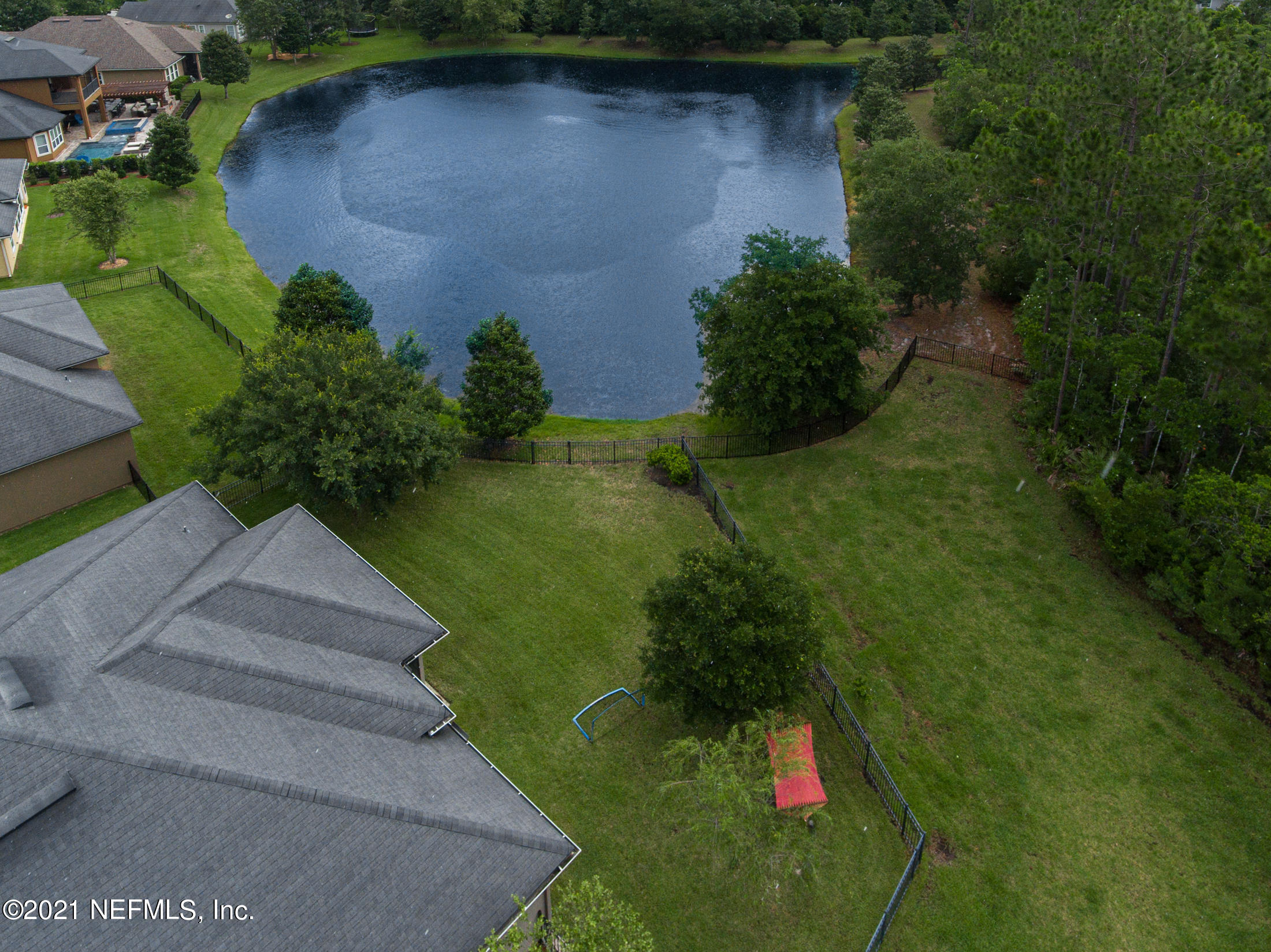 198 Glen Laurel Drive St. Johns, FL 32259 - Photo 50 of 51 an aerial view of a house with pool yard outdoor and green space