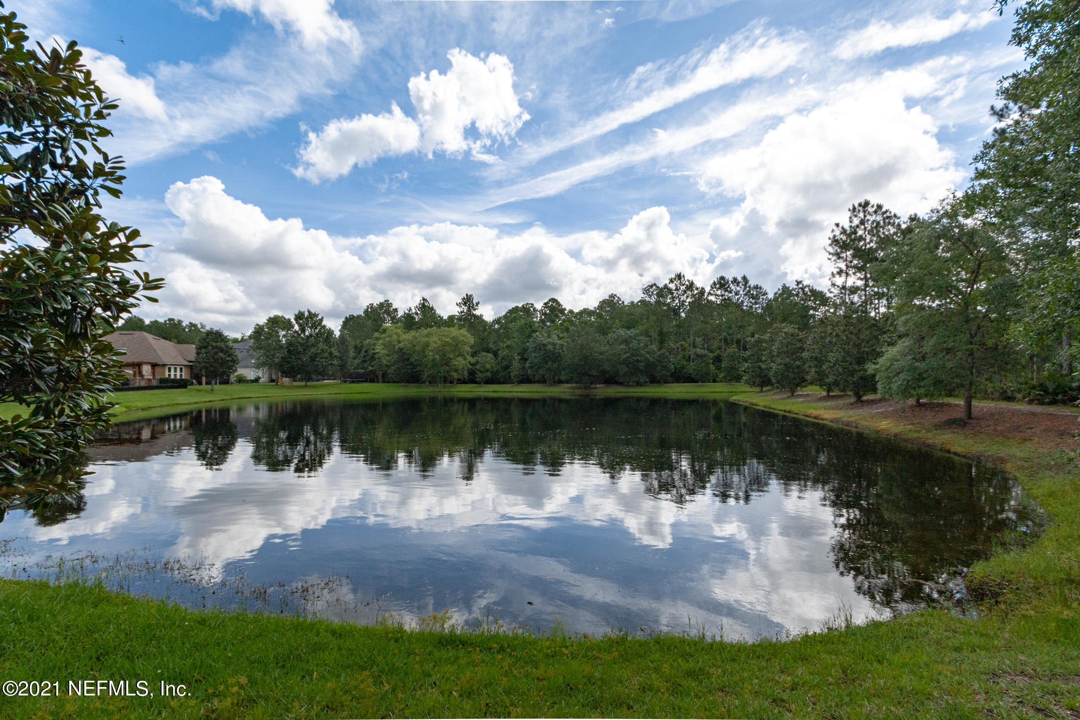 198 Glen Laurel Drive St. Johns, FL 32259 - Photo 7 of 51 a view of a lake with a big yard