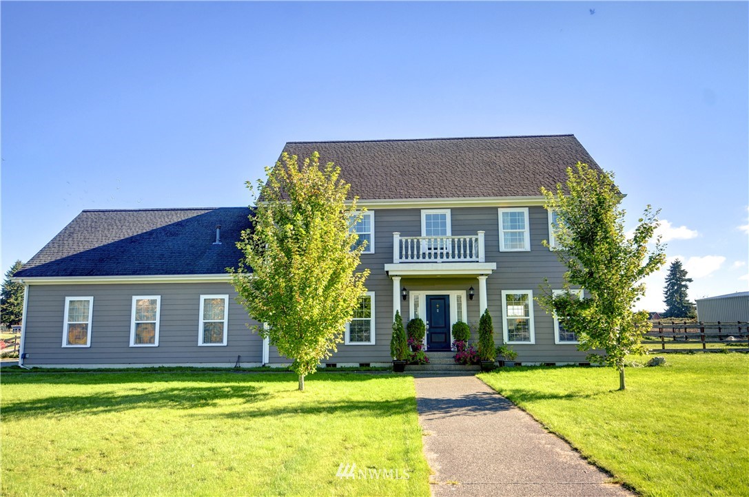 17012 Kaylen Lane Southwest Rochester, WA 98579 - Photo 1 of 26 a view of a house with a swimming pool