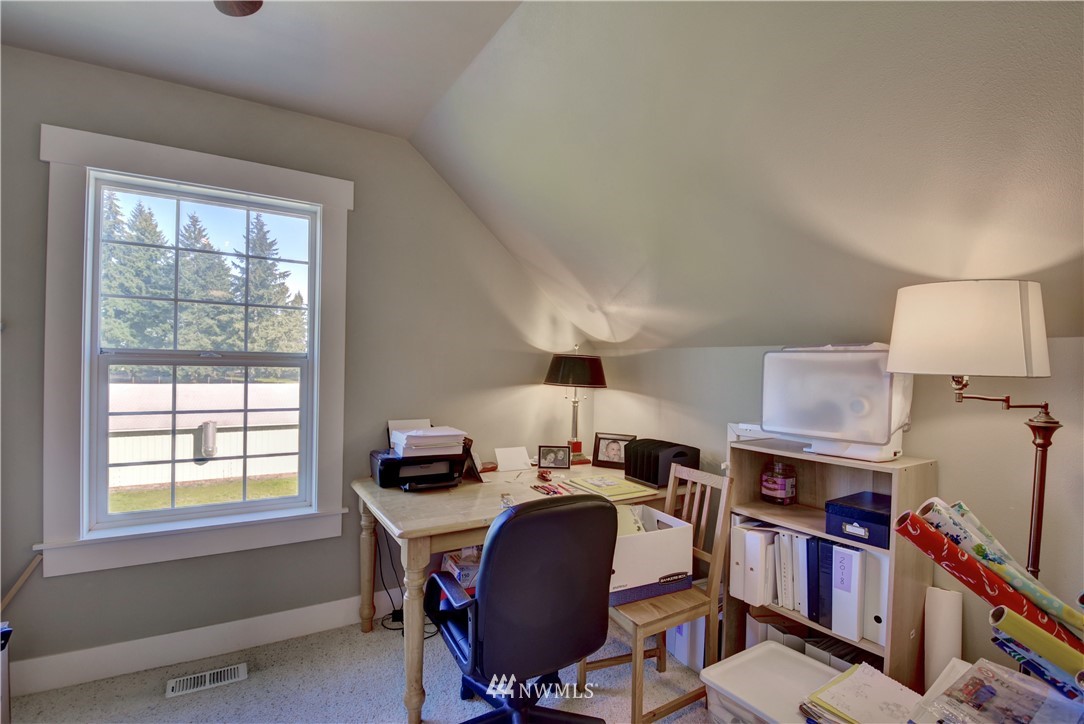 17012 Kaylen Lane Southwest Rochester, WA 98579 - Photo 14 of 26 a view of a workspace with furniture and a window