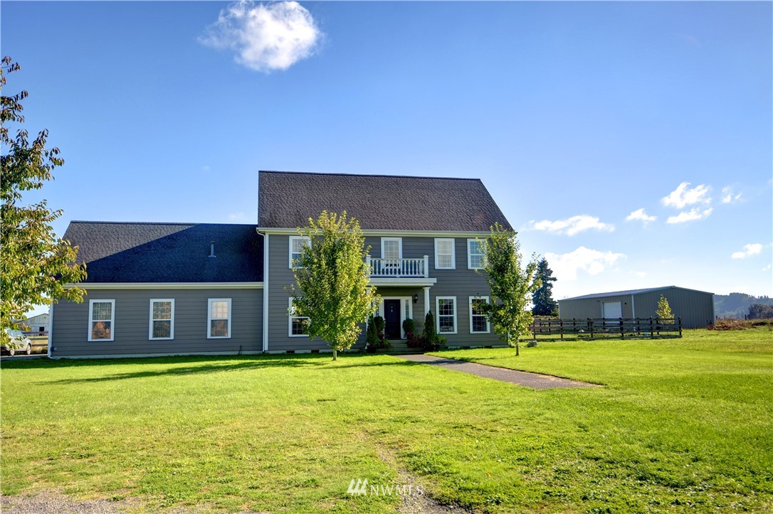 17012 Kaylen Lane Southwest Rochester, WA 98579 - Photo 18 of 26 a front view of a house with a yard