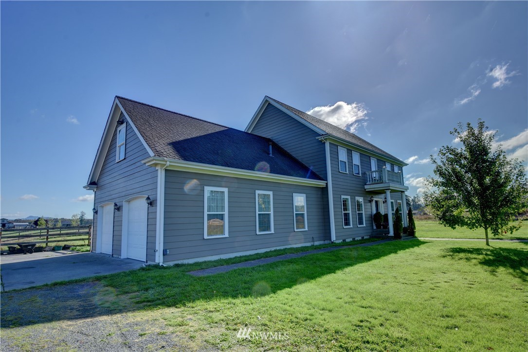 17012 Kaylen Lane Southwest Rochester, WA 98579 - Photo 25 of 26 a view of a house with a yard