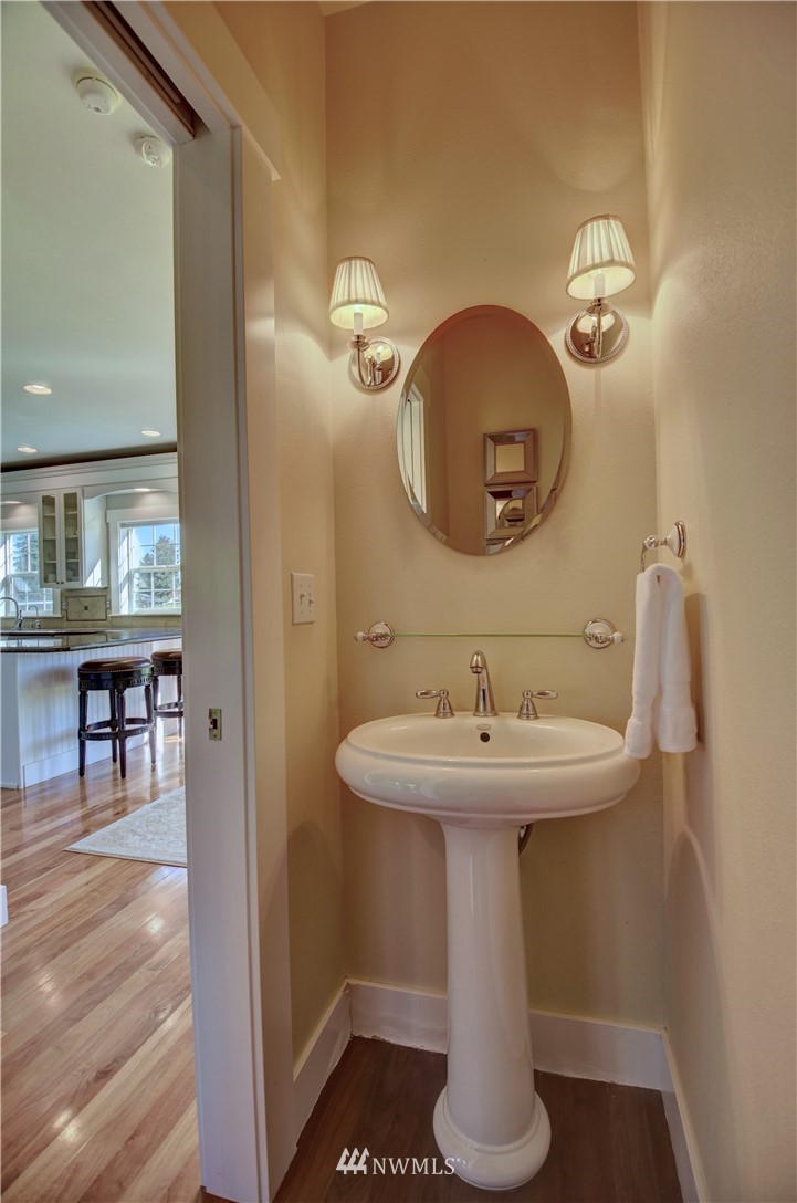 17012 Kaylen Lane Southwest Rochester, WA 98579 - Photo 9 of 26 a bathroom with a sink and a mirror
