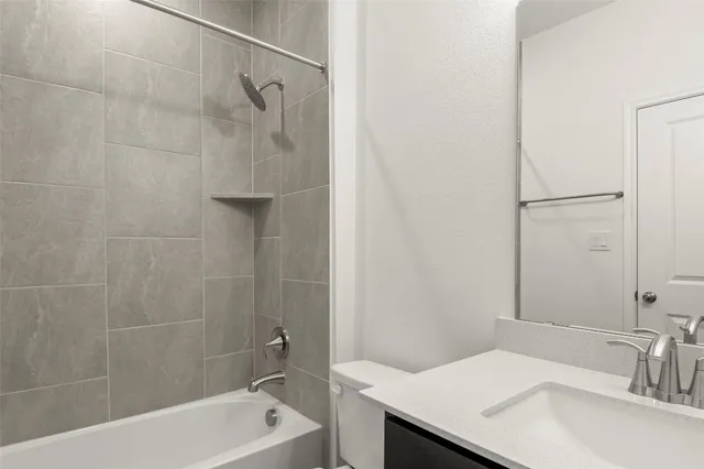 a bathroom with a sink and a bathtub