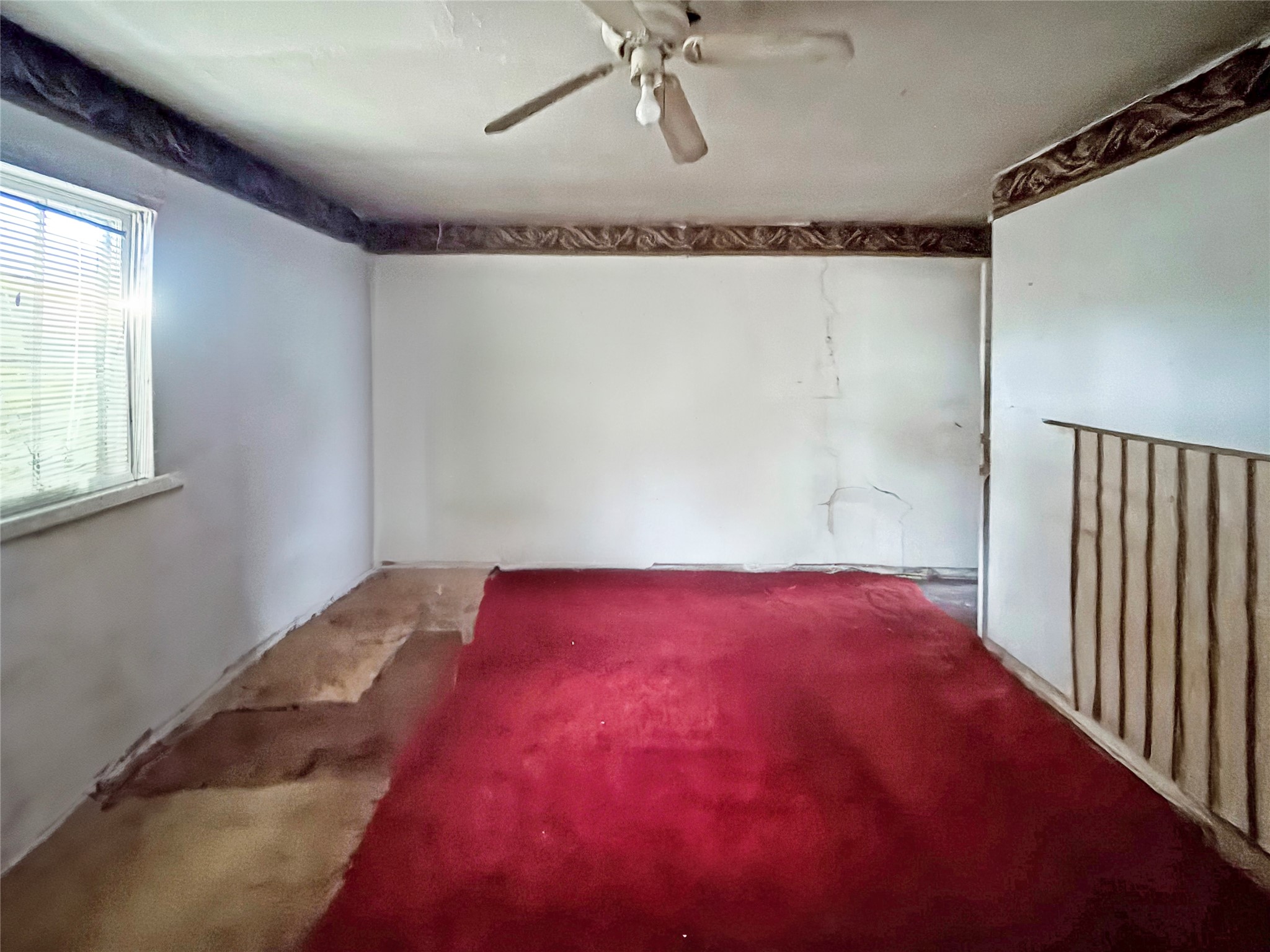 6723 London Street Houston, TX 77021 - Photo 7 of 14 a view of a big room with wooden floor closet and windows