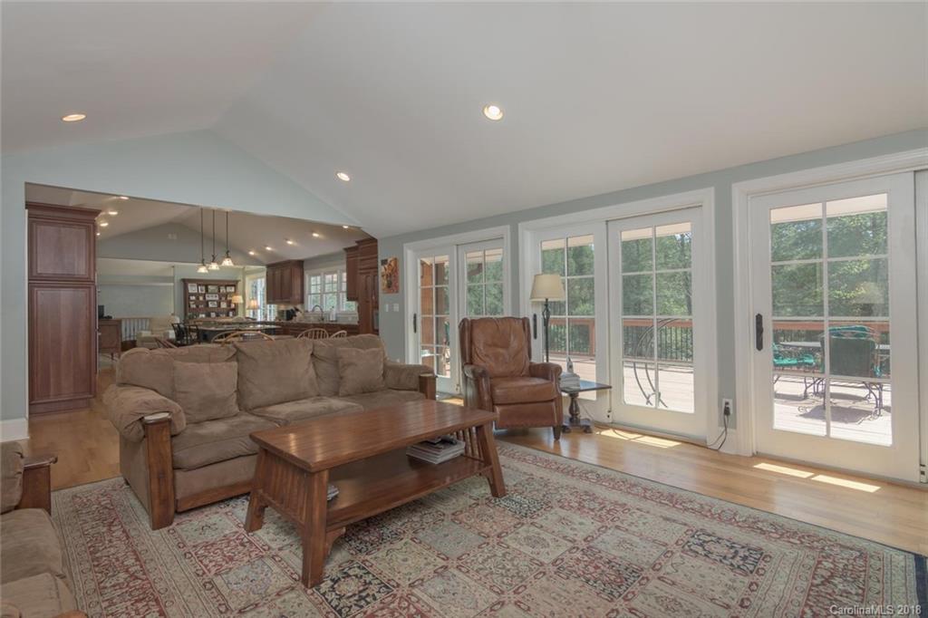 85 Forest Road Asheville, NC 28803 - Photo 14 of 39 a living room with furniture and a large window