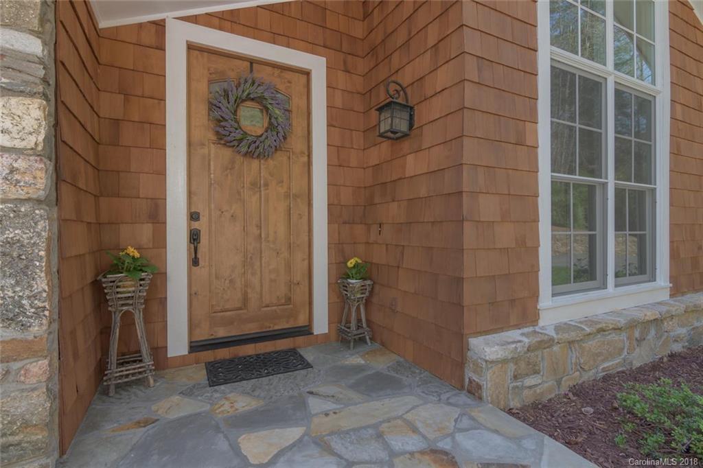 85 Forest Road Asheville, NC 28803 - Photo 4 of 39 a view of a door and wooden door